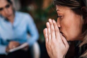 a patient and a therapist interact in a anxiety treatment program